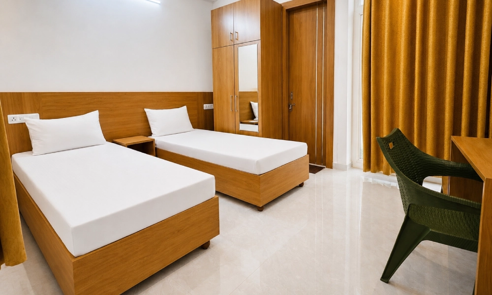 Twin AC Shared Room at Haritha Ayurveda Academy — view 1